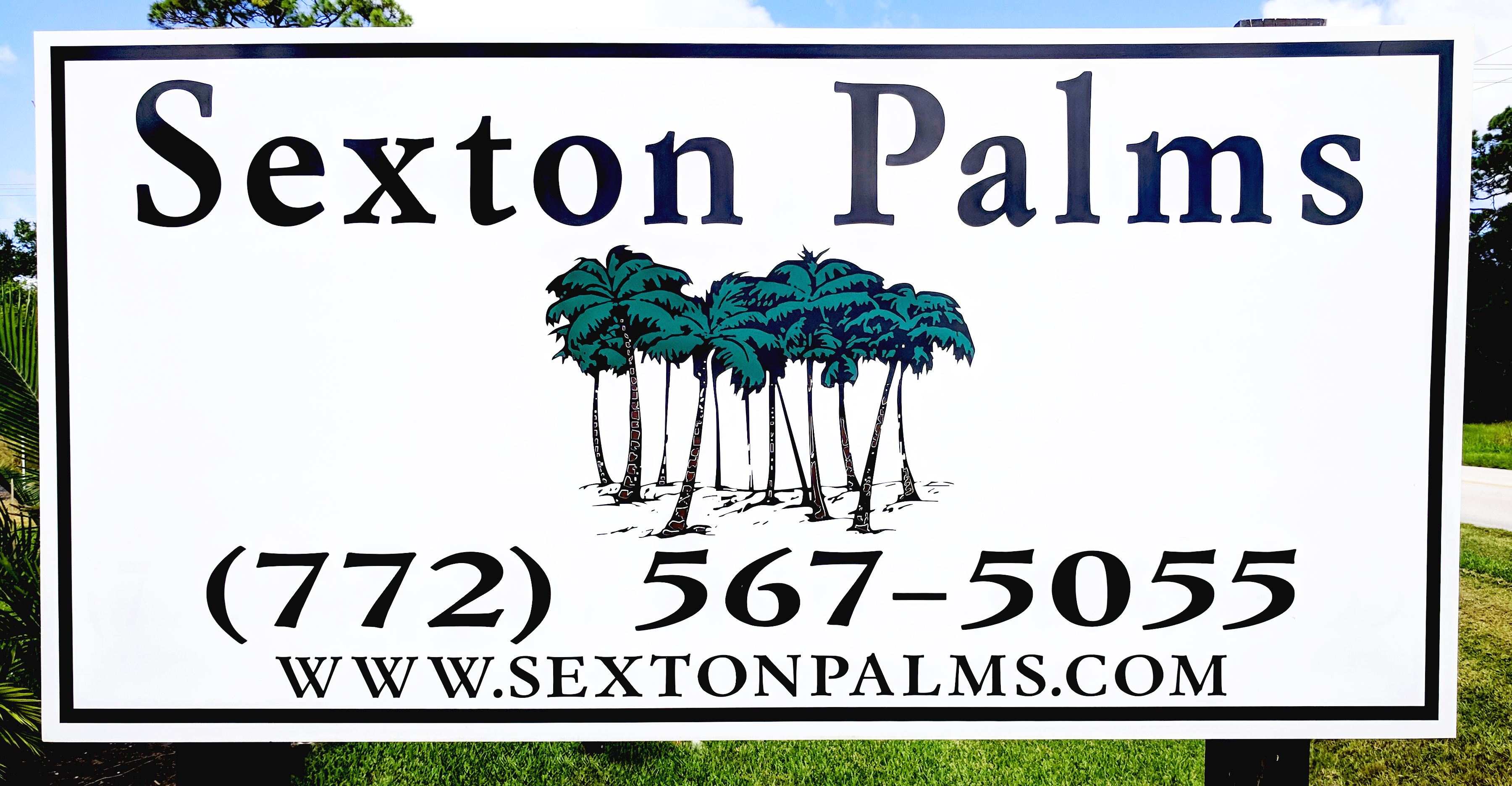Photo of road sign with palm tree images and the text: Sexton Palms, (772) 567-5055, www.sextonpalms.com