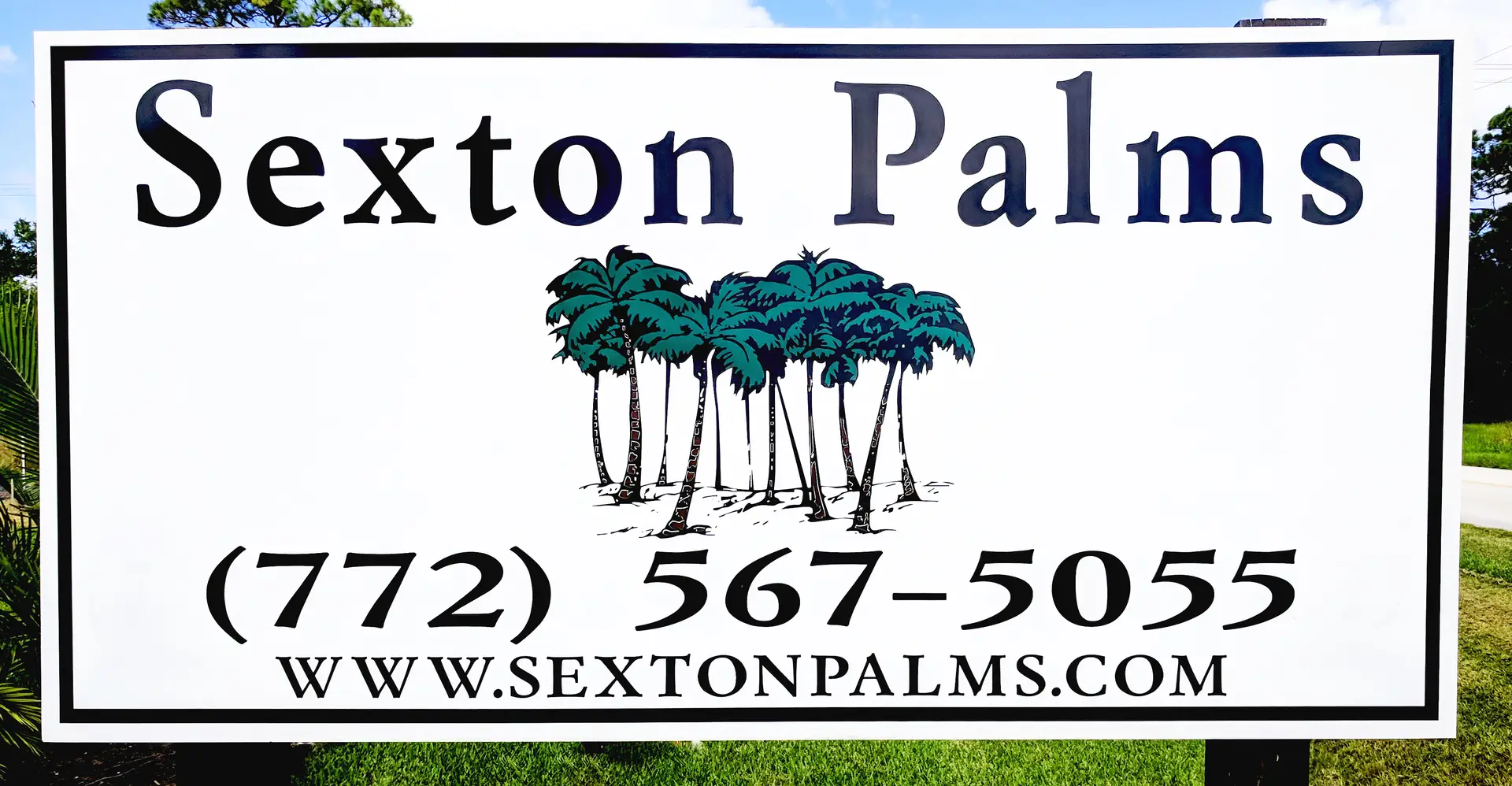 Photo of road sign with palm tree images and the text: Sexton Palms, (772) 567-5055, www.sextonpalms.com